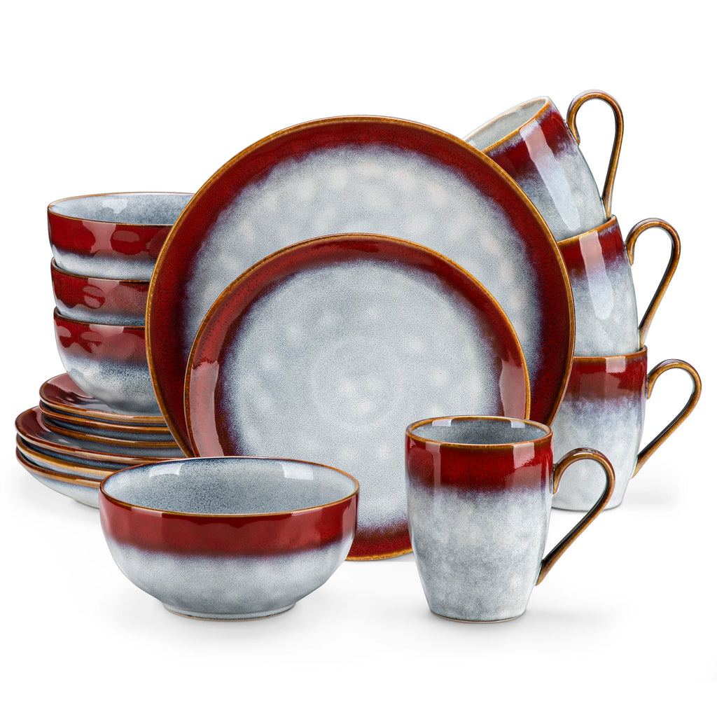 Red and gray dinner plates, smaller plates, bowls and handled mugs arranged in stacks on a white background.