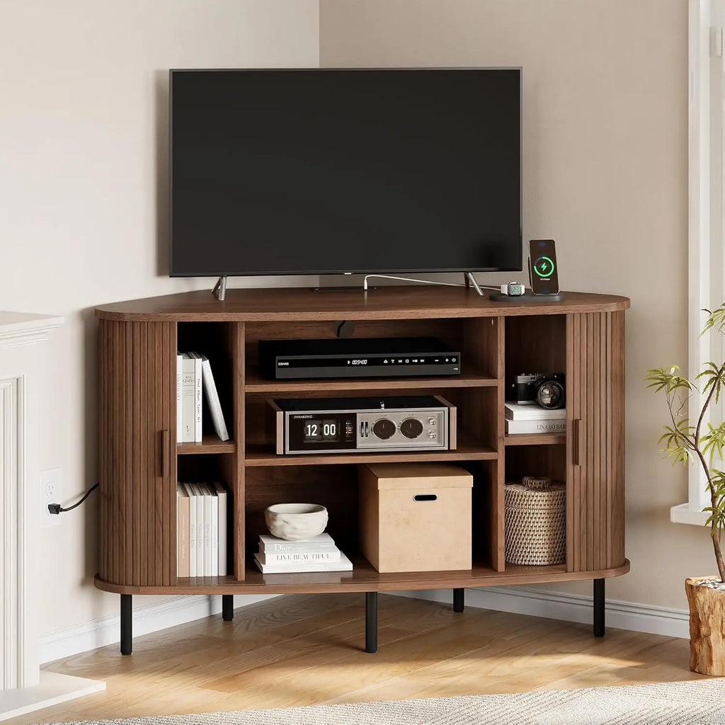 Doveveil TV stand with open center and side shelves holding media components, books, and baskets.