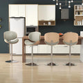 Cressline gray bar stools viewed from the front and back along a kitchen island
