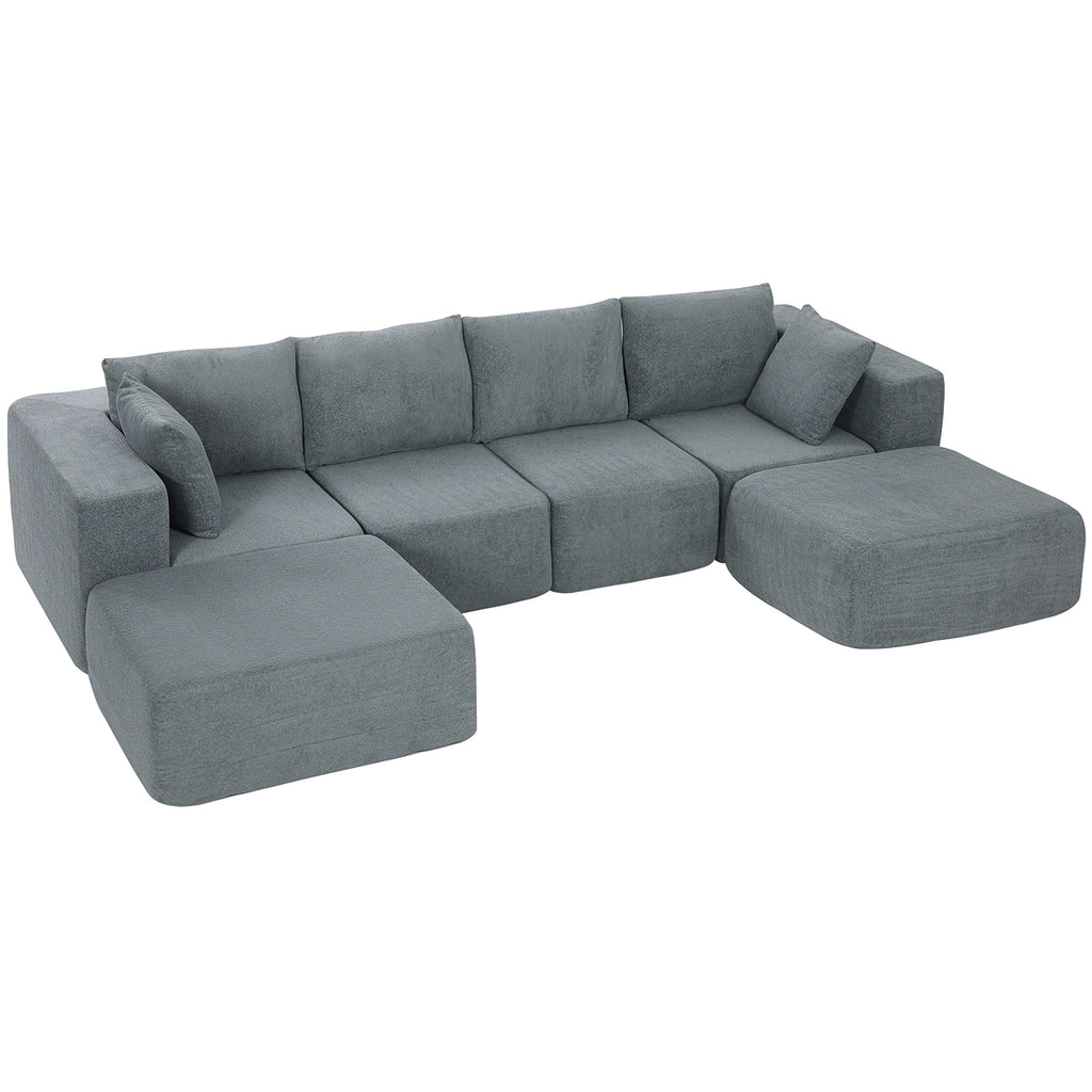 Dark gray Valegrove sectional with four seats and two ottomans in a U-shaped arrangement
