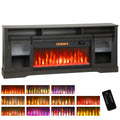 Threadveil dark gray fireplace TV stand with glass-front sliding doors and remote control.