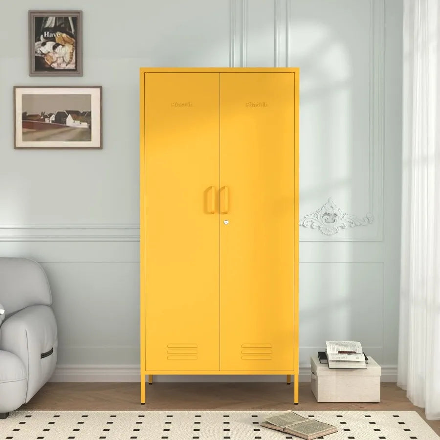 Front view of the closed mustard armoire with a keyhole below the door handles.