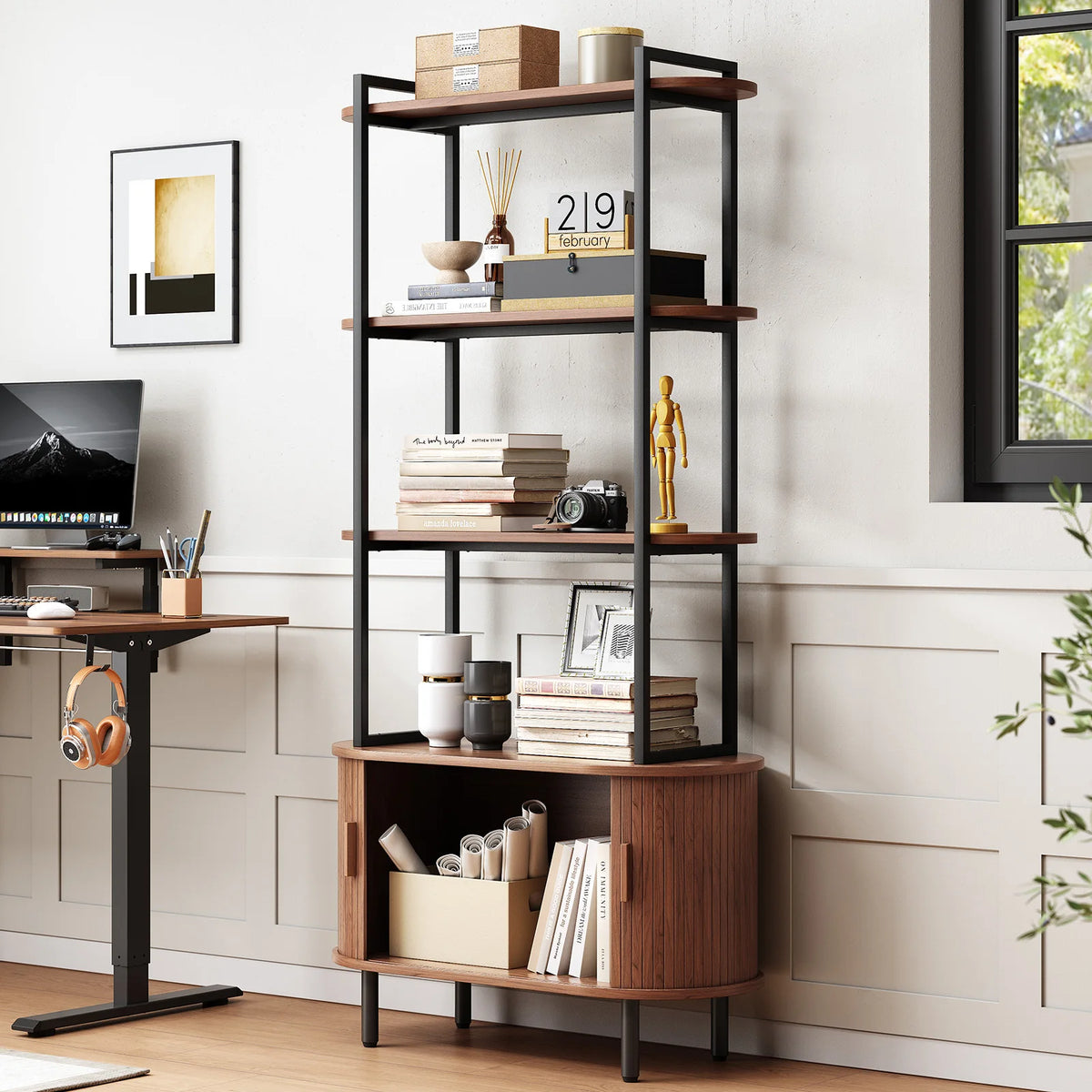 Walnut Fableecho bookcase beside a desk with the lower sliding cabinet open