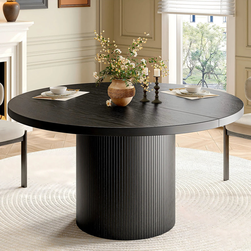 Duskwhisper black round dining table with fluted pedestal base