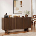 Silhouettehalo walnut-look sideboard with four fluted doors and a raised base