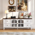 Fawnarc White TV stand with a dark top, four drawers, two arched glass doors and turned feet.