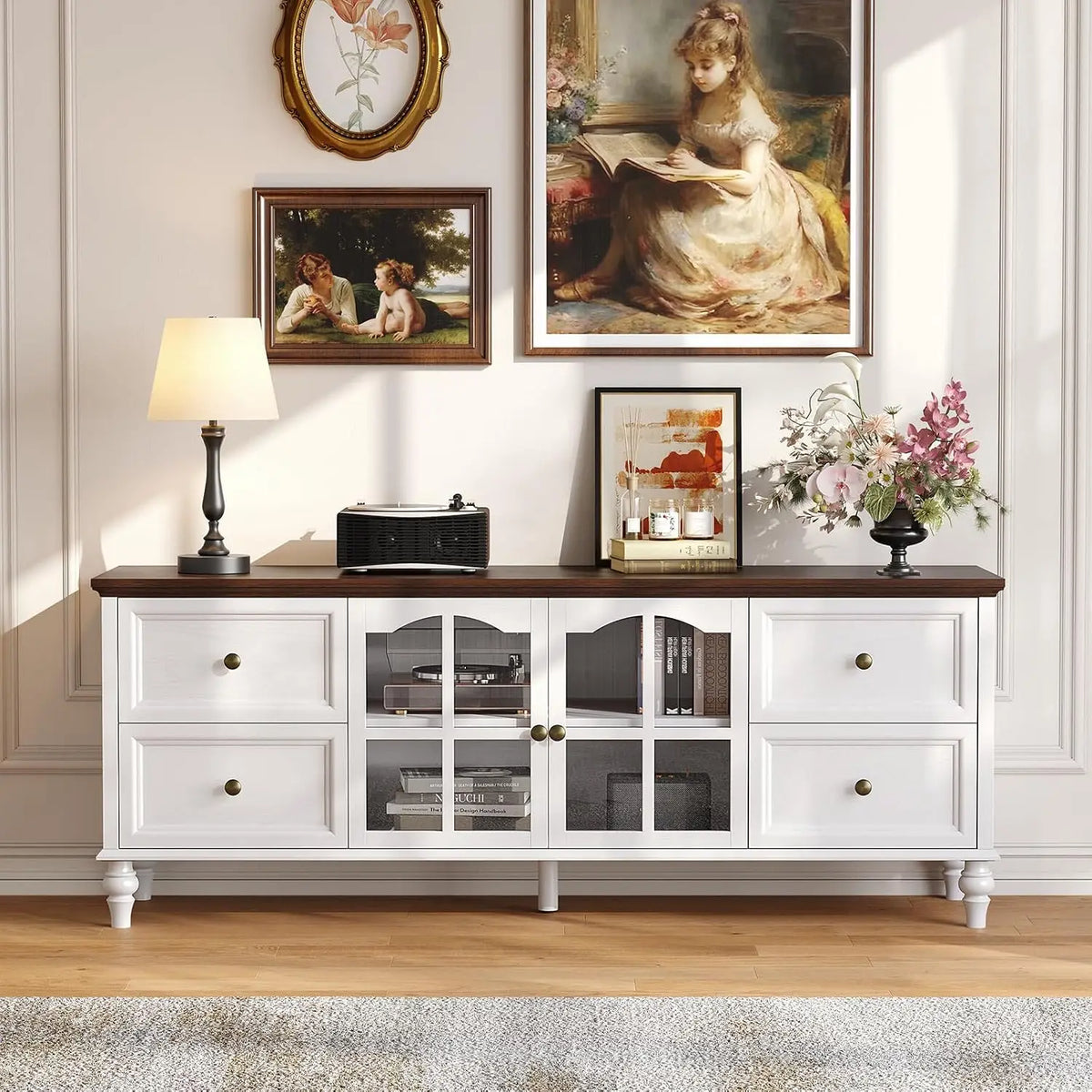 Fawnarc White TV stand with a dark top, four drawers, two arched glass doors and turned feet.