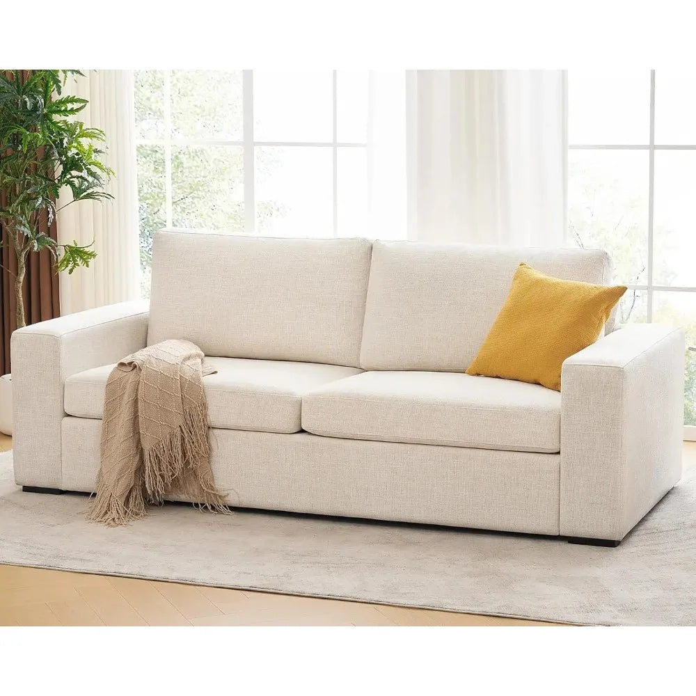 Elarwyn Beige sofa with two seat cushions, two back cushions, broad square arms, and low feet.