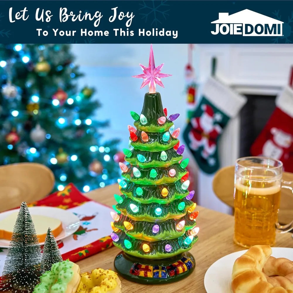 Merryglaze green ceramic Christmas tree styled on a dining table among seasonal decorations.