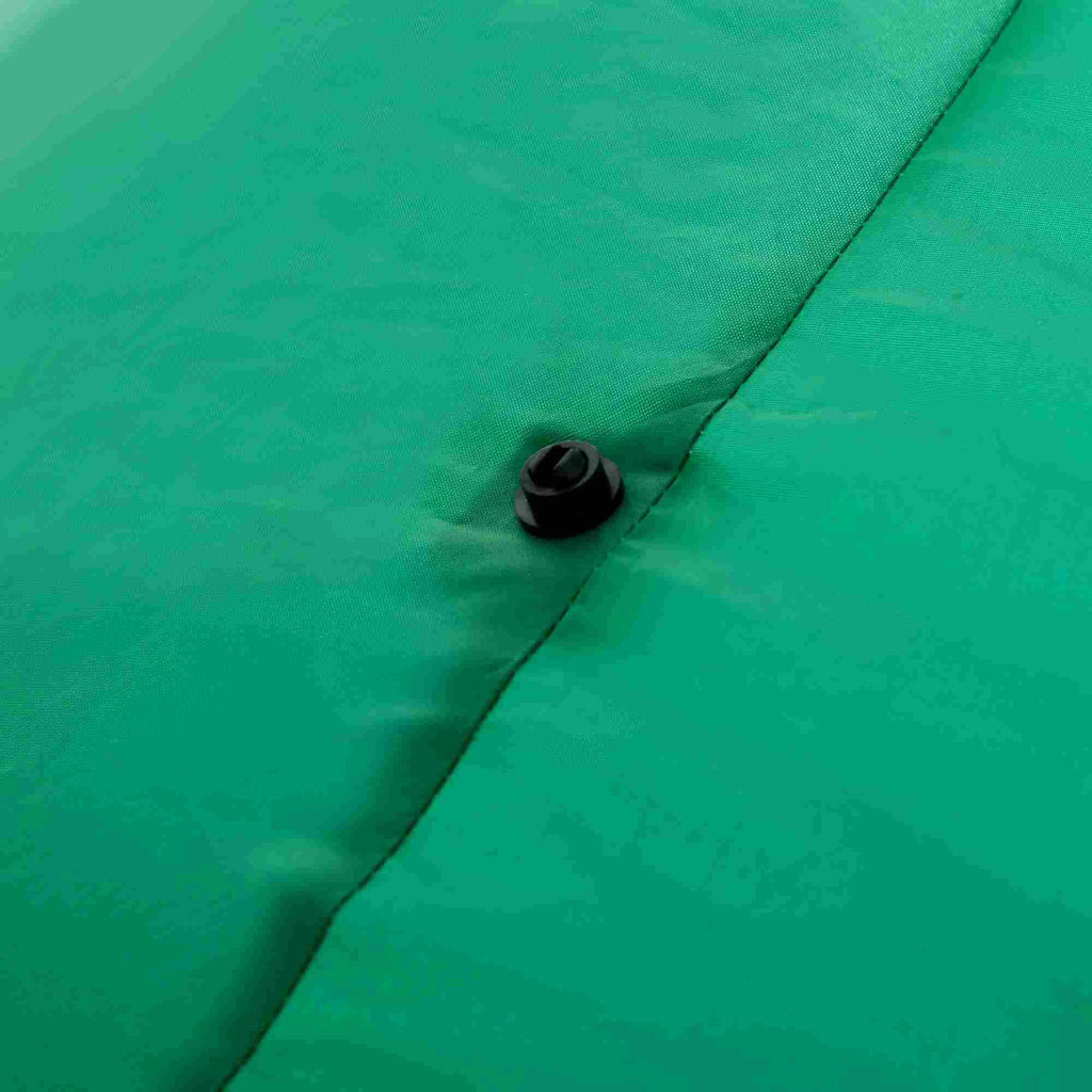 Close-up of the green fabric and attachment point on the Merrysaurus inflatable