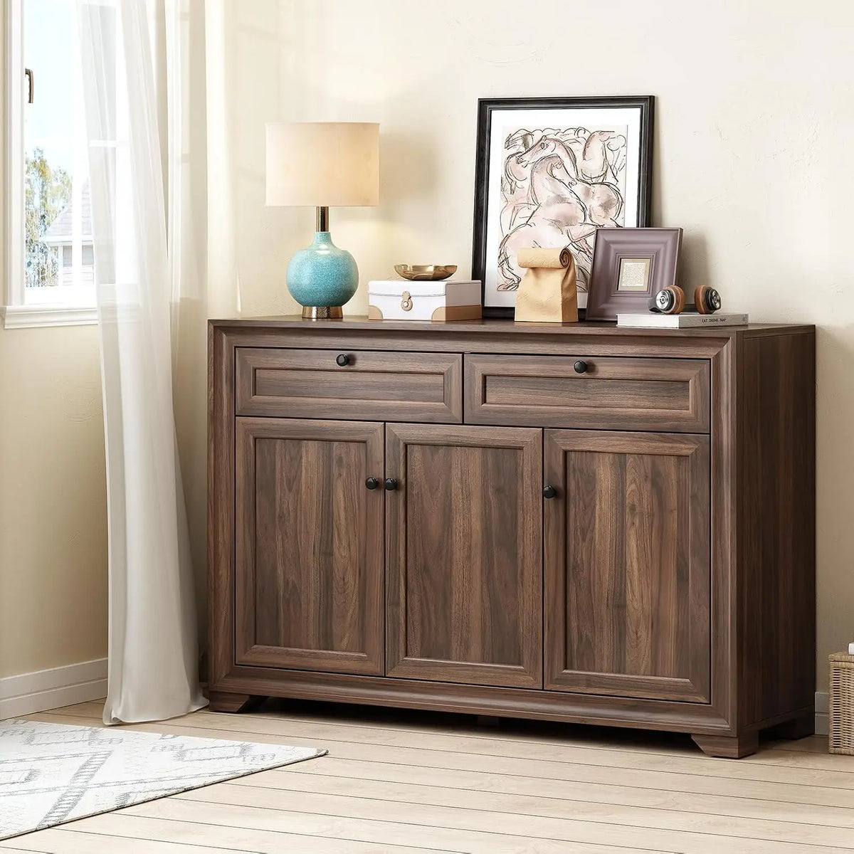 Olive Brown sideboard with paneled doors, two drawers and short block feet.