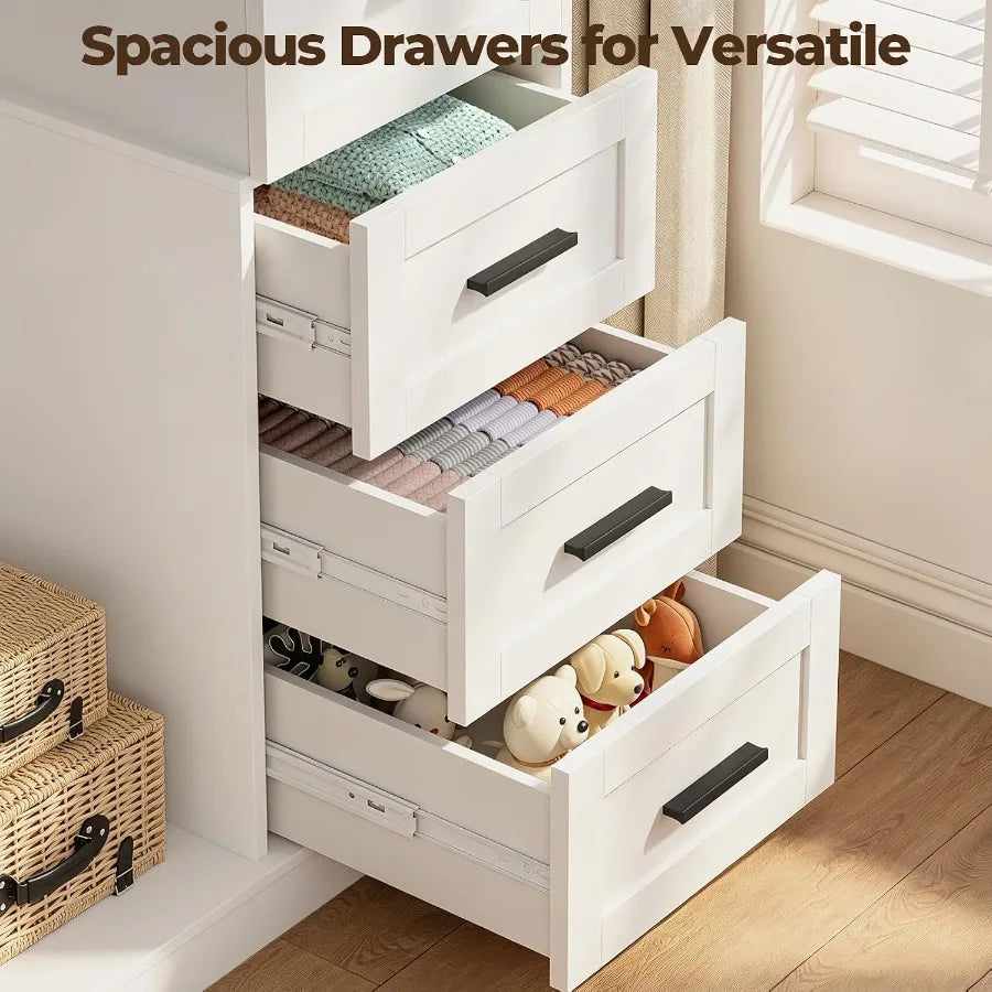 Angled detail of the three open storage drawers with recessed-panel fronts and dark bar handles.