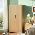 Light wood-tone two-door fluted wardrobe in bedroom