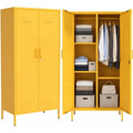 Closed and open views of a mustard-yellow wardrobe with two vented doors, a key lock, shelves and hanging space.