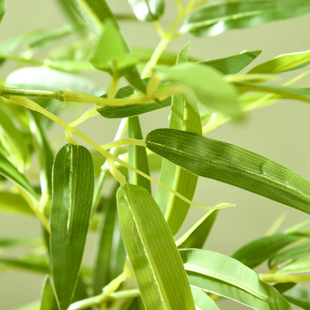 Arusha close-up of green artificial bamboo-style leaves and stems