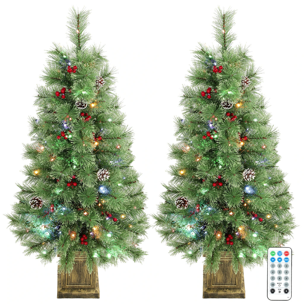 Berryglow set of two pre-lit Christmas trees with berries, pinecones, and decorative pot bases