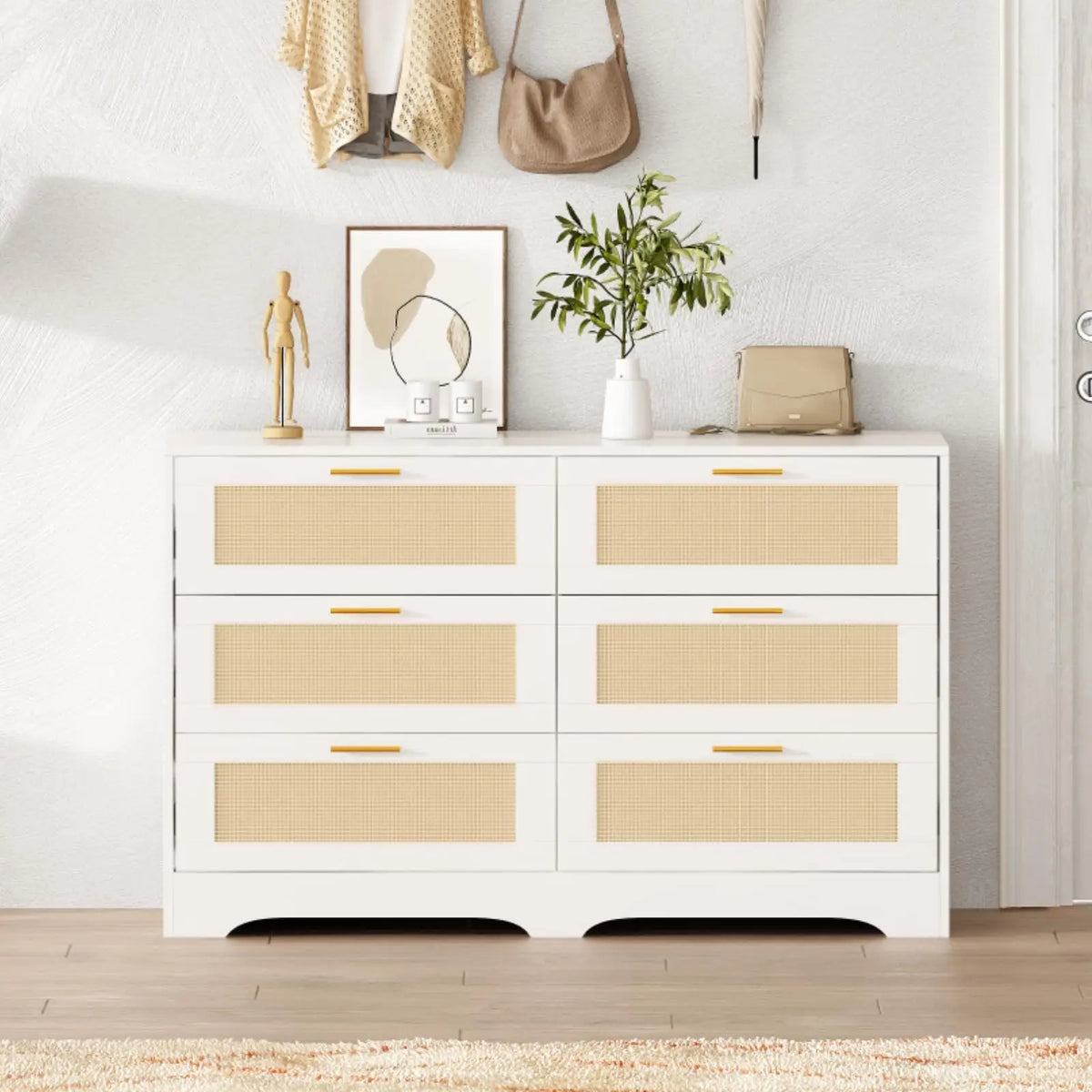 Merewick White six-drawer dresser in an entryway