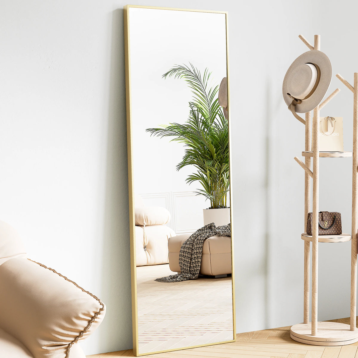 Sageecho rectangular Gold full-length floor mirror leaning against a wall