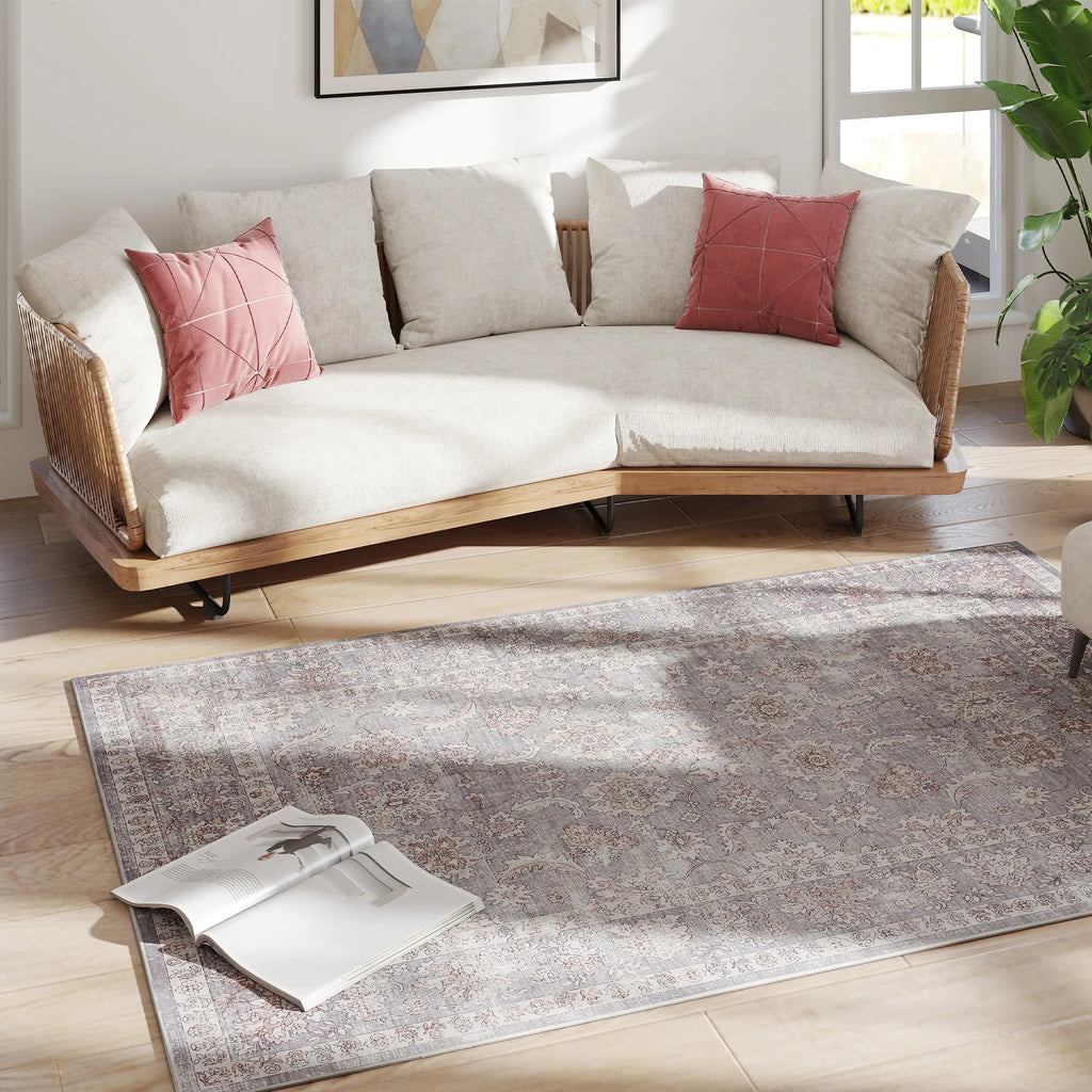 Sagerise distressed floral area rug in a sitting area