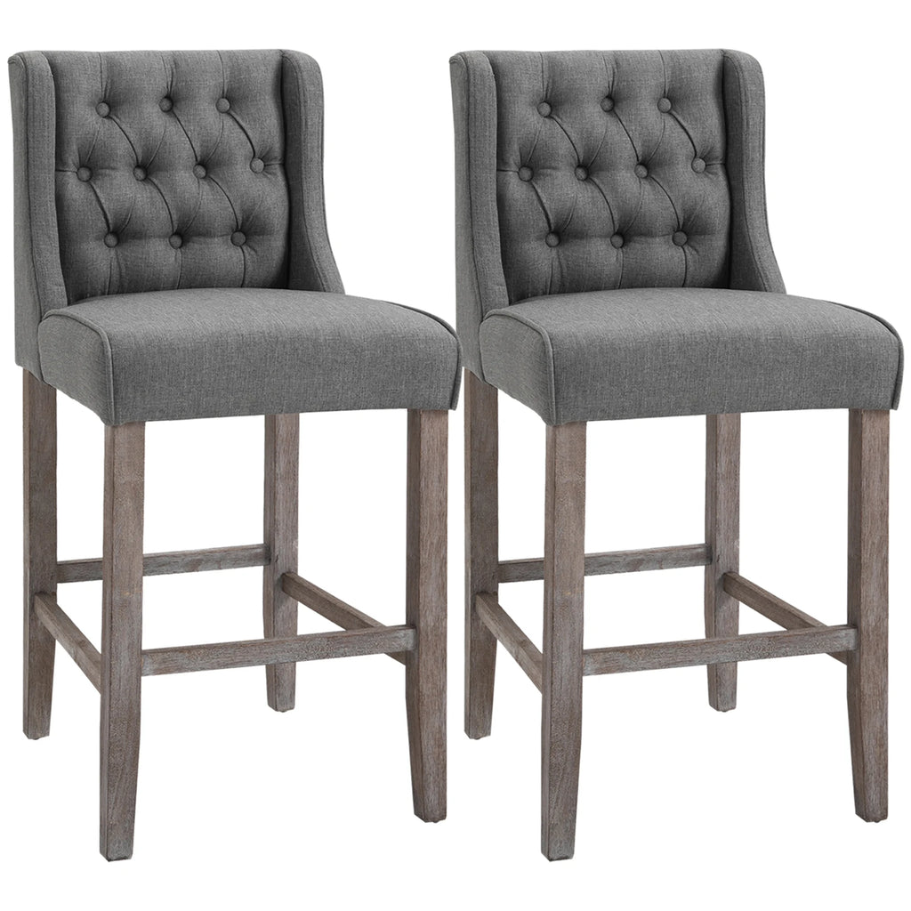 Tuftora gray wingback counter stools styled at a kitchen counter