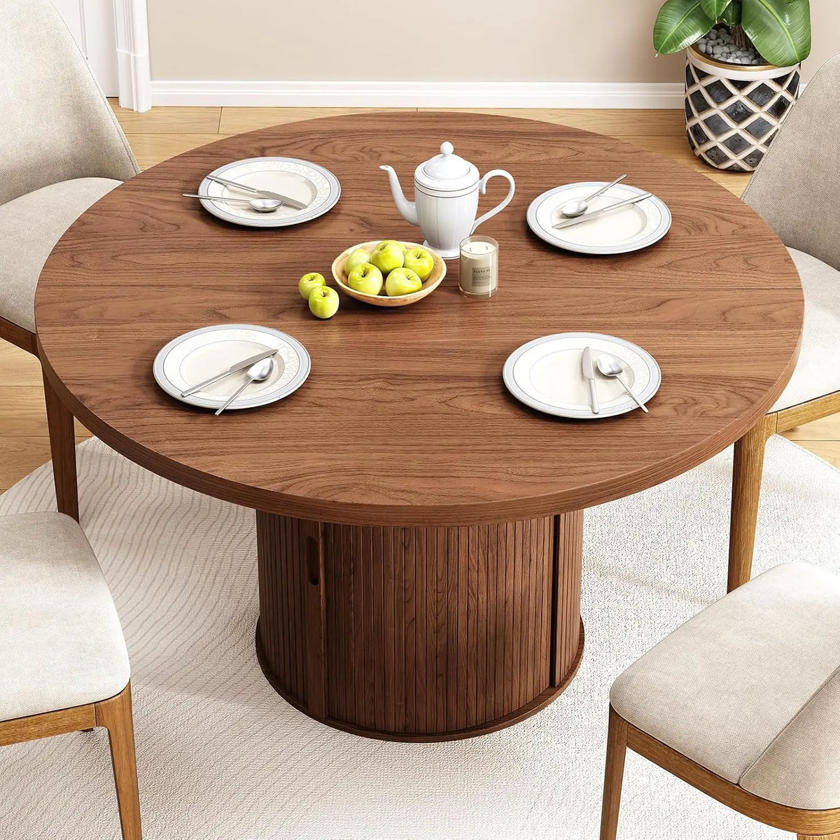 Rhymelark round tabletop above its closed fluted storage pedestal