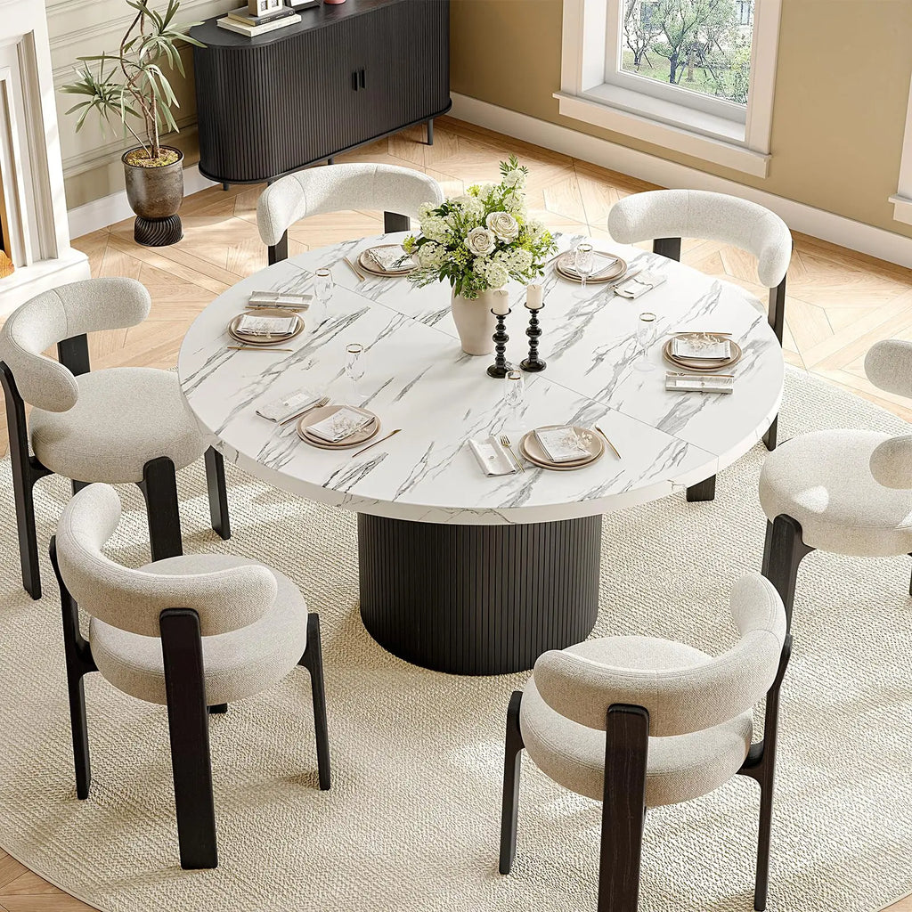 Elevated view of the Duskwhisper marble-texture round table with a black fluted pedestal, styled with six chairs.