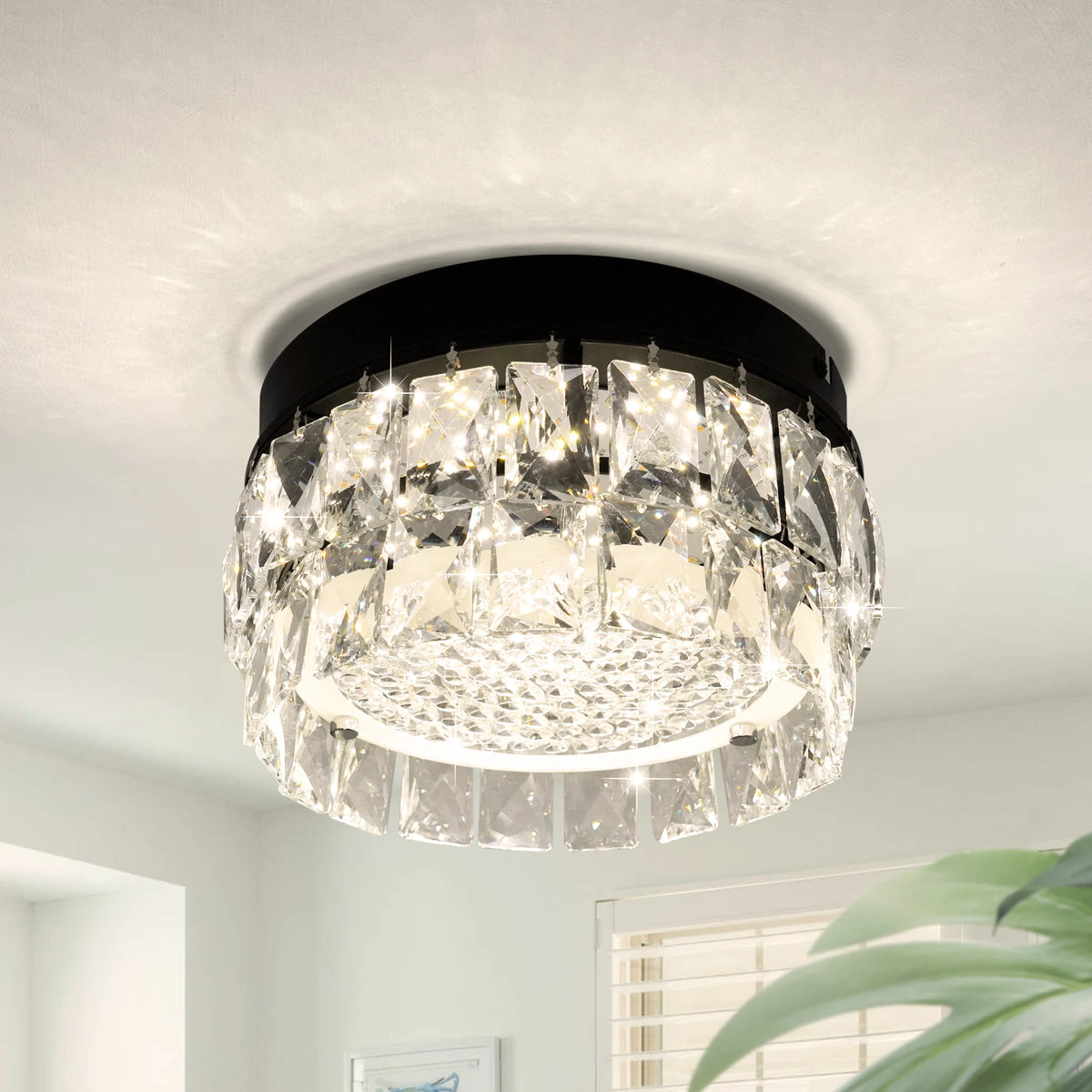 Glacielle: Black round flush-mount ceiling light with faceted crystal drops and an illuminated underside