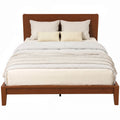 Bambelle queen platform bed with a bamboo headboard and white duvet