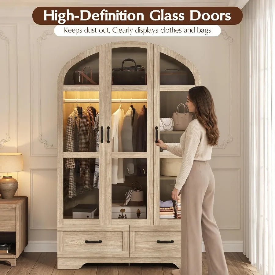 Glass-door feature view of the wardrobe with a person at the right-side handle.