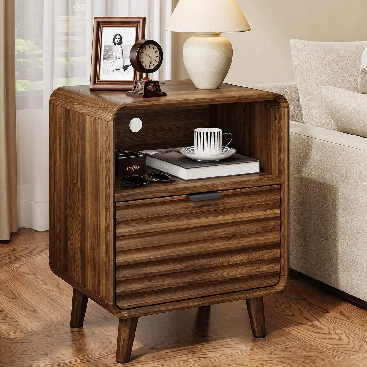 Hushray walnut woodgrain-look rounded nightstand with wave-front drawer and open cubby beside bed