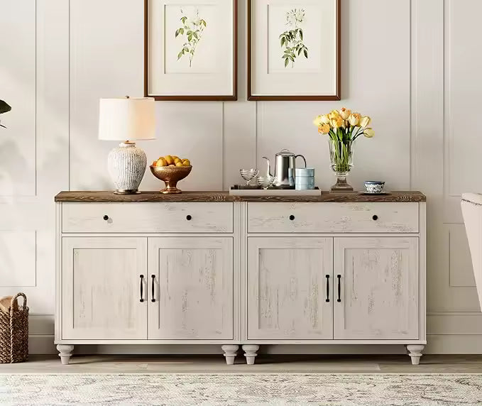 Credenza with decorative items against a neutral wall