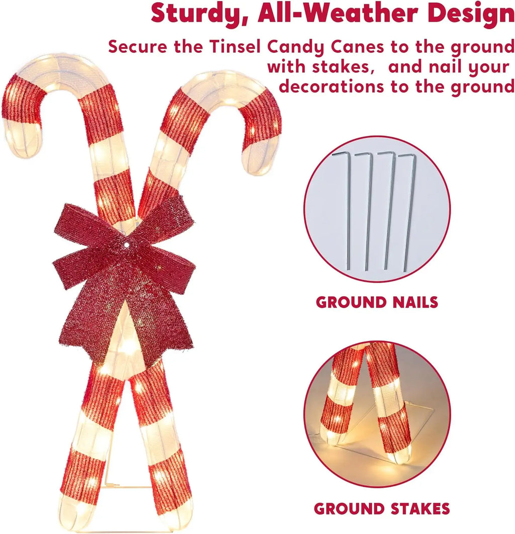 Bowglint candy-cane decoration with ground stakes securing its supporting base.