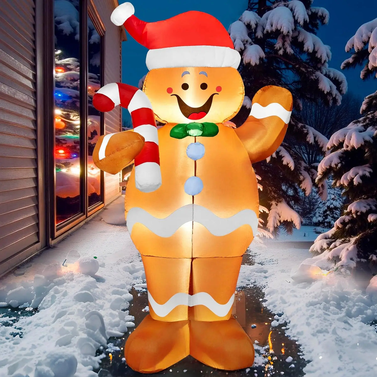 Sugarwave smiling gingerbread character glowing beside a home entrance at night.