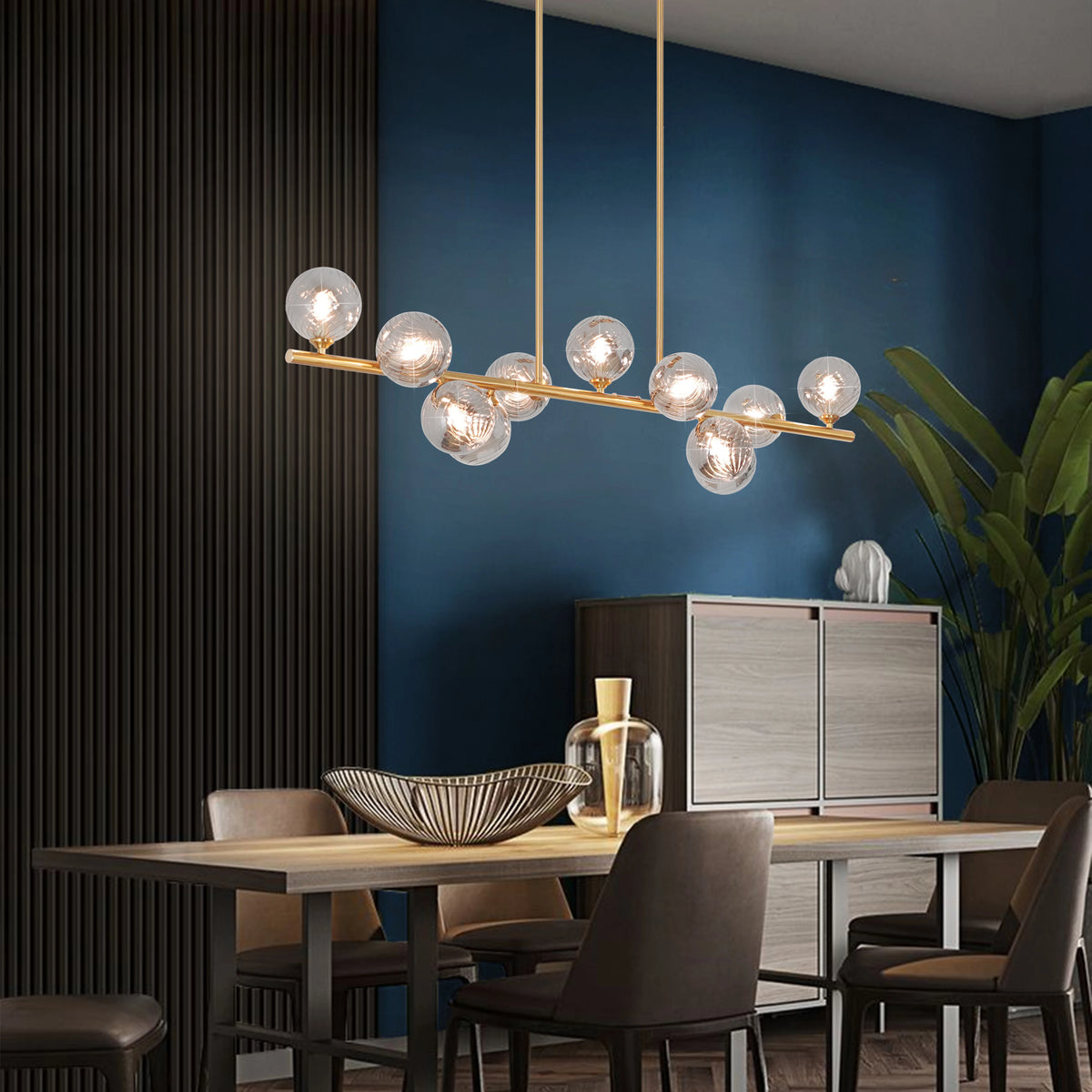 Orbstem striped glass shade and gold-tone metal details shown close up.
