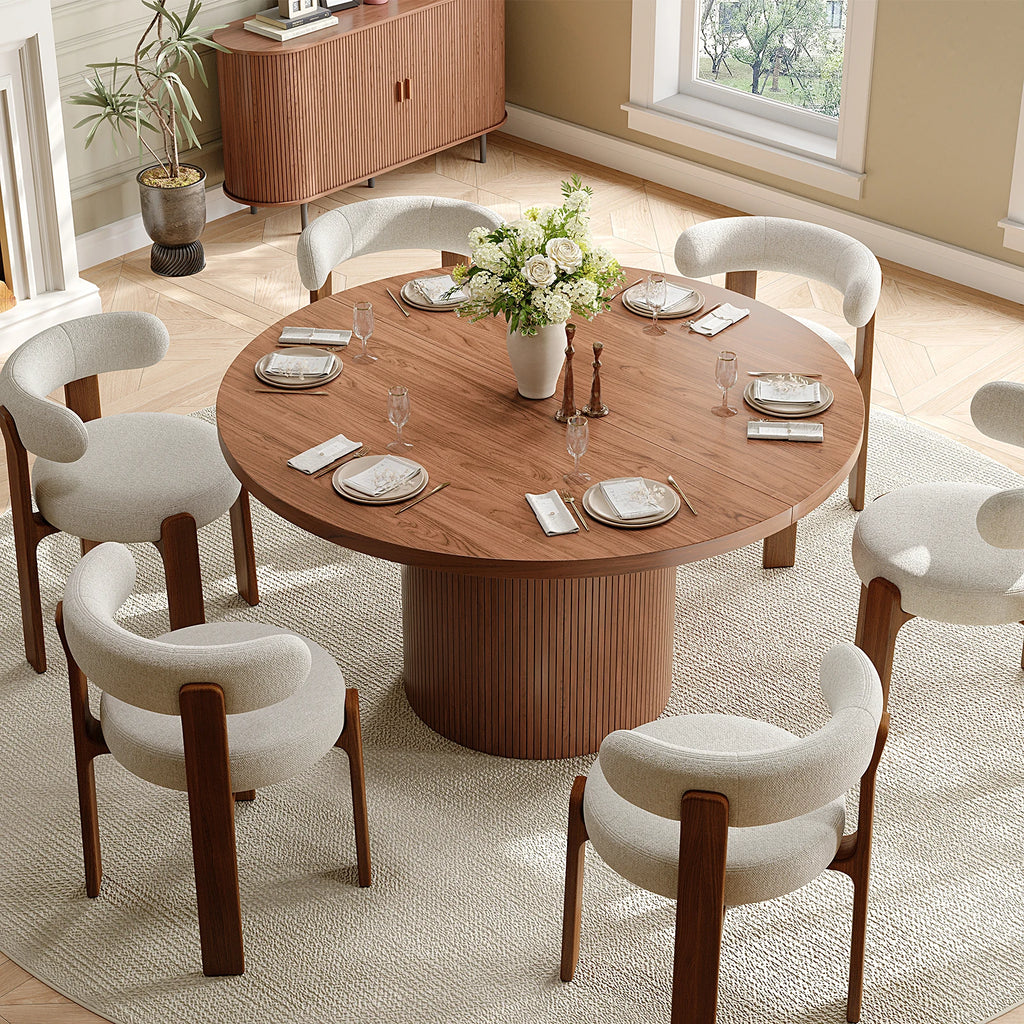 Elevated view of the Duskwhisper walnut-finish round table, styled with six chairs and place settings.