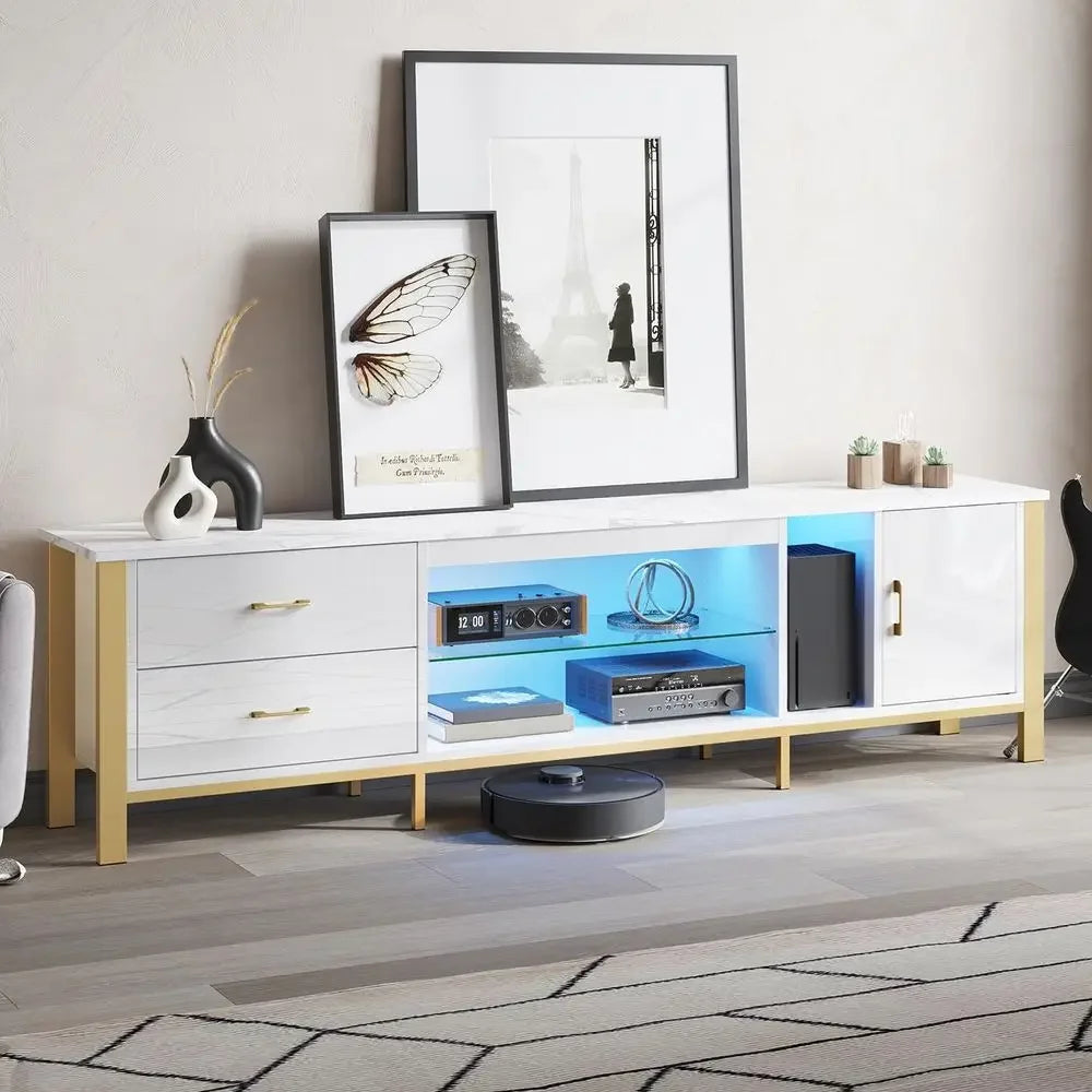 Merovelle white marble-look console with gold-tone legs and blue-lit open shelving