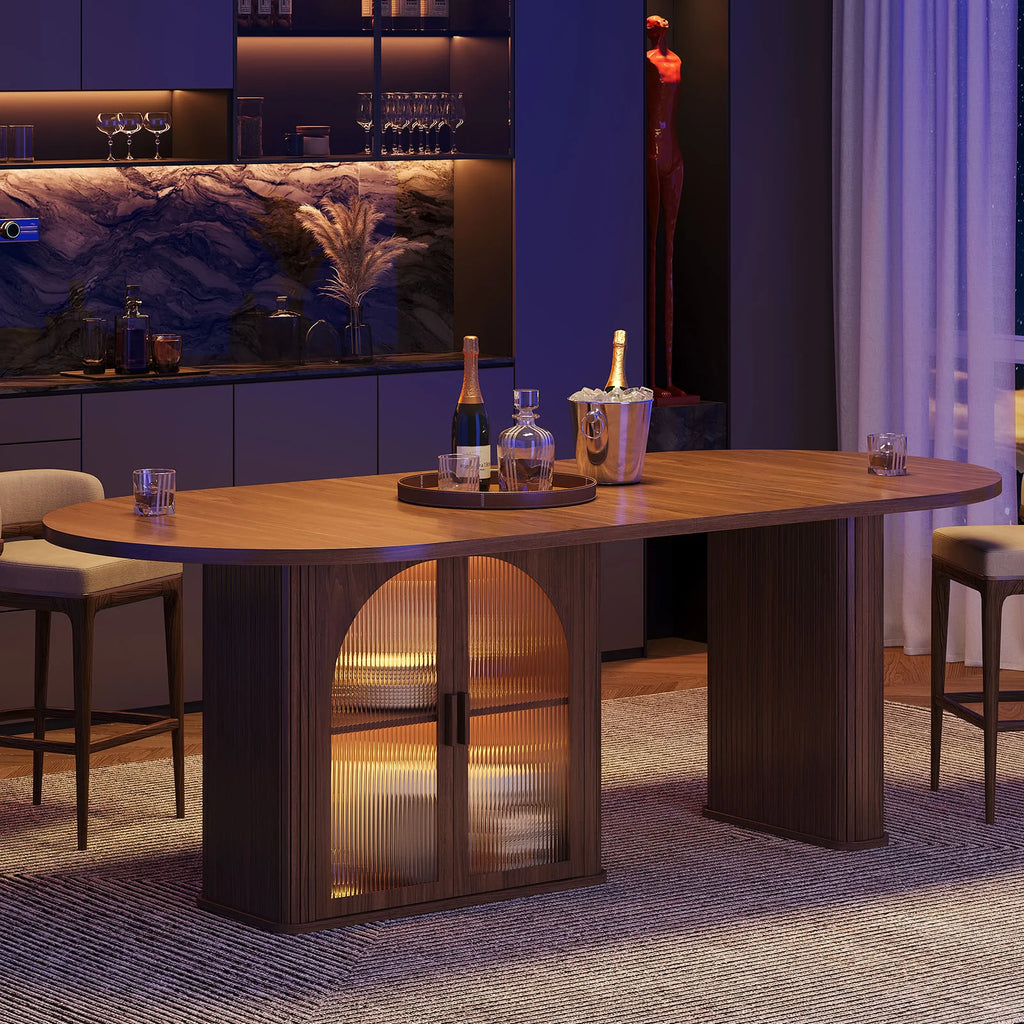 Duskhalo Brown oval table with warm lighting inside the glass-front cabinet.