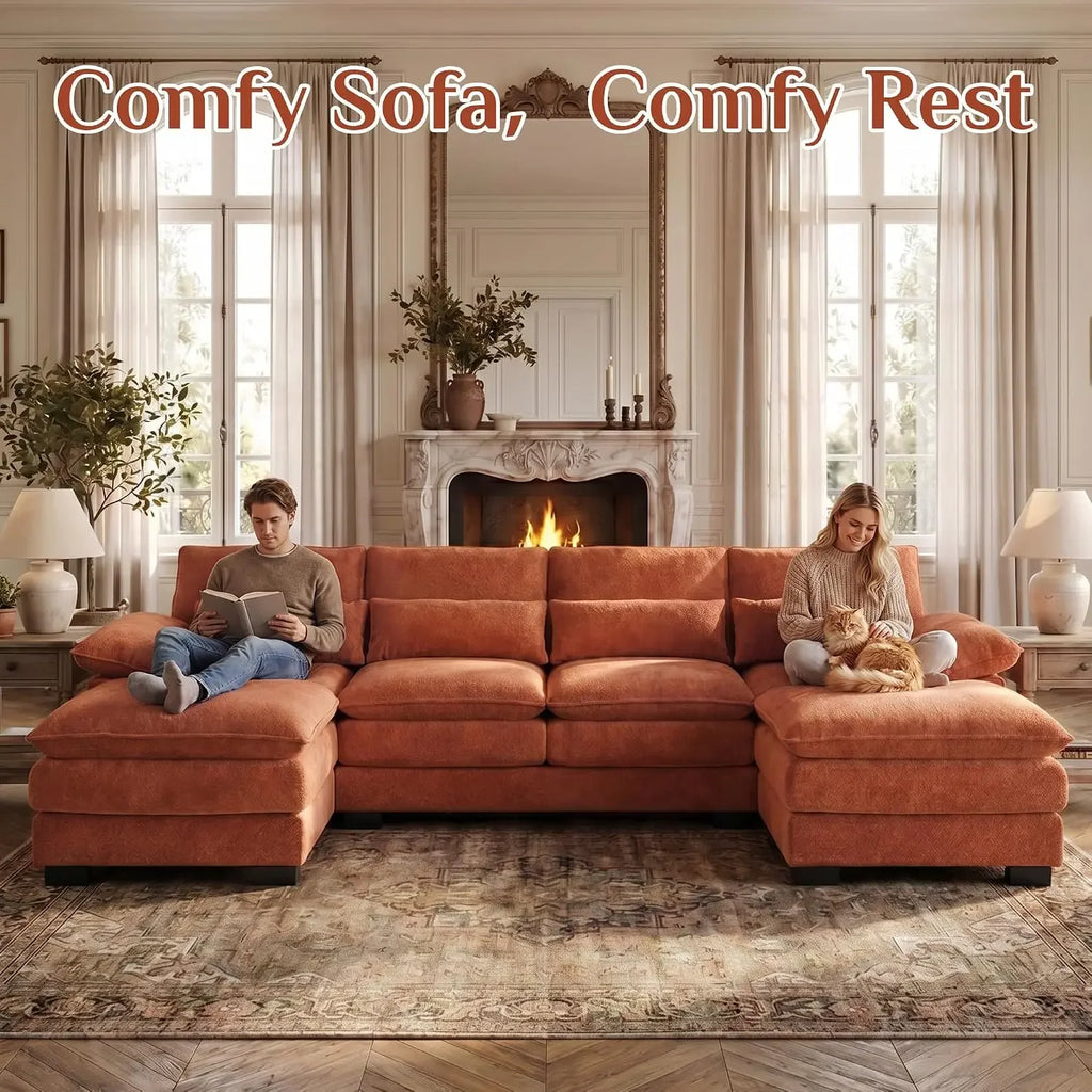Orange Halewyn U-shaped sectional shown with two people relaxing on opposite chaise ends