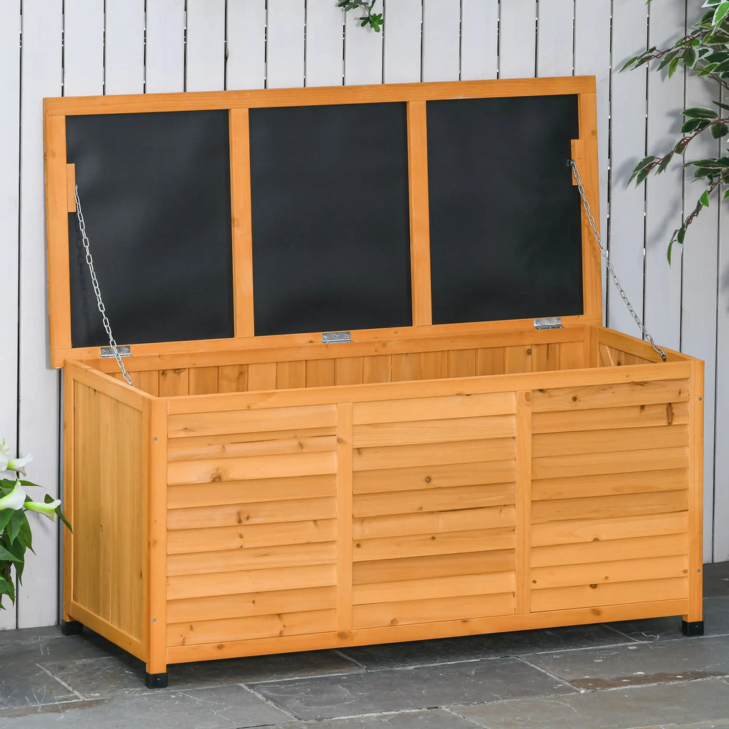 Langmere fir wood deck box with hinged lid and support chains on a patio