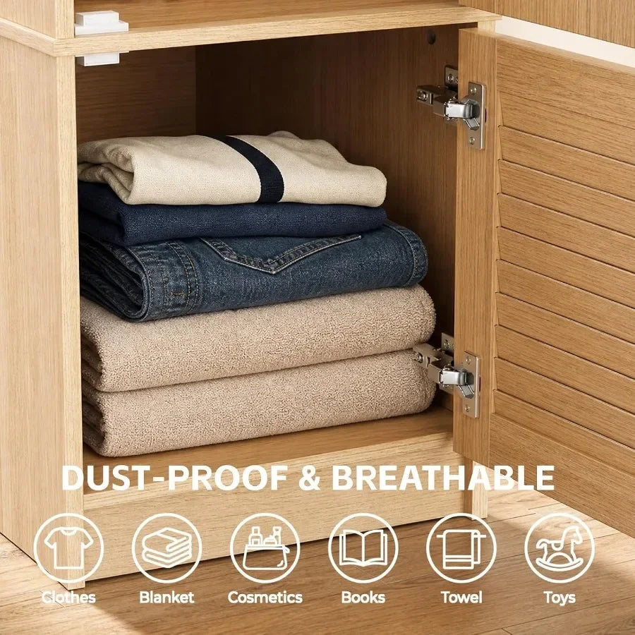 Lower armoire compartment with louvered door and folded linens