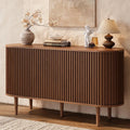 Liltcrest walnut-look sideboard with curved ends, fluted sliding doors and five tapered legs
