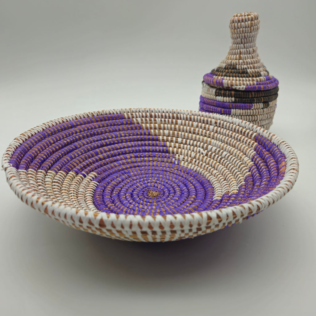 Purple Senegalese handwoven shallow basket with coordinating lidded basket